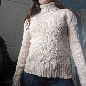 Janet Howard  pink wool turtleneck sweater